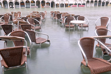 Chairs On The Water Of Adriatic Sea In Main Square Of Venice In