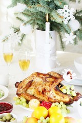 Poster - turkey for Christmas. New Year's and Christmas table with turkey in white tones.