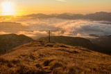 Fototapeta Krajobraz - Mountain sunrise with big cross on Ogradi, Bohinj