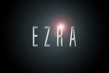 Fototapeta Młodzieżowe - first name Ezra in chrome on dark background with flashes