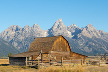 A View Of A Deserted Wooden Barn On Mormon Row In Grand Teton National Park At Sunrise