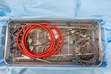 A Tray For Surgical Instruments Contains Various Assorted Instruments For Performing An Operation