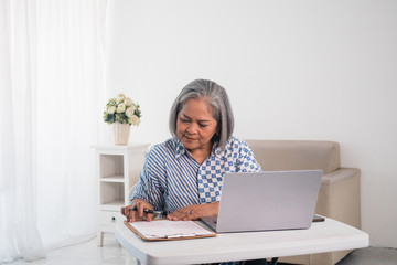 Wall Mural - Old woman confident is seriously beautiful when handling her business