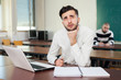 © JackF - Young guy studying with laptop