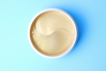 transparent patches under in round jar top view, a concept of moisturizing and skin care