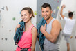 © auremar - portrait of a happy couple at a climbing rock wall