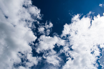 sunlight an clouds on the blue sky