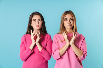 Poster - Photo of serious caucasian women ooking upward and thinking