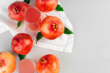 Sticker - Glass of pomegranate juice and fruits on a table