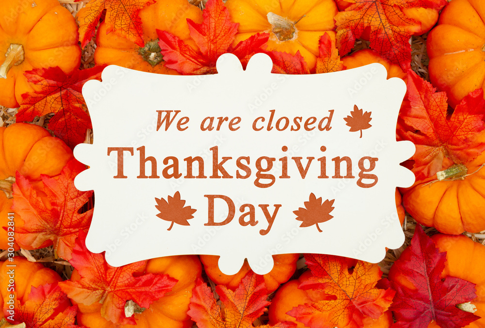 We are Closed Thanksgiving Day sign on a metal sign on pumpkins - obrazy, fototapety, plakaty 