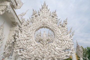 Wall Mural - Wat Rong Khun, beautiful temple with amazing sculptures in Chiang Rai, Thailand