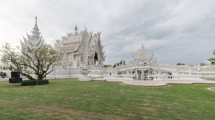 Wall Mural - Wat Rong Khun, beautiful temple with amazing sculptures in Chiang Rai, Thailand