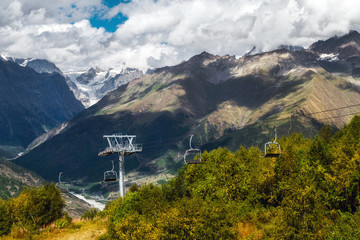 ropeway down from Hatsvali Ski resort to Mestia with mountain Shkhara and its glacier on background