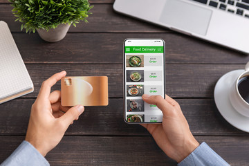 Poster - Man using credit card and smartphone with food delivery application