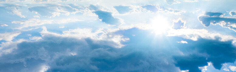 Wall Mural - Beautiful blue sky with white clouds and sun