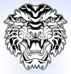 Lion's portrait made in an old-stylized tattoo. Vector illustration for coloring book, t-shirts, tattoo art, boho design, posters, textiles. Isolated vector illustration.