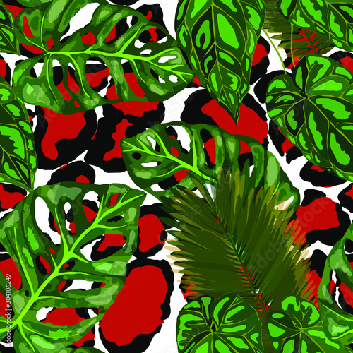 Seamless pattern with tropical leaves on leopard spots. Beautiful allover pri...
