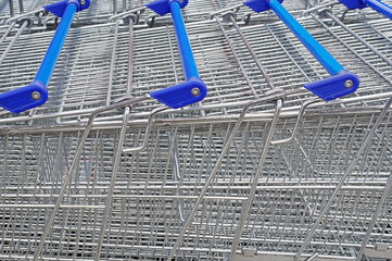 Rows of shopping carts on car park