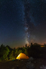 Wall Mural - starry night with the milky way on the turkish mediterranean coast amidst the rocky mountains with t