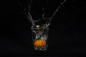 orange splash in glass