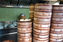 Fresh Baozi In Bamboo Steamer On Chinese Food Street