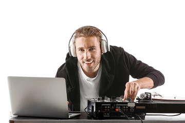 Wall Mural - Male dj playing music on white background