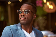 Portrait Of Young Confident American Businessman In Sunglasses And Blue Blazer.