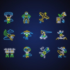 Poster - Air extreme sport neon light icons set. Skydiving, parachuting, wingsuiting. Outdoor activities. Paragliding, aerobatics and bungee jumping. Glowing signs. Vector isolated illustrations