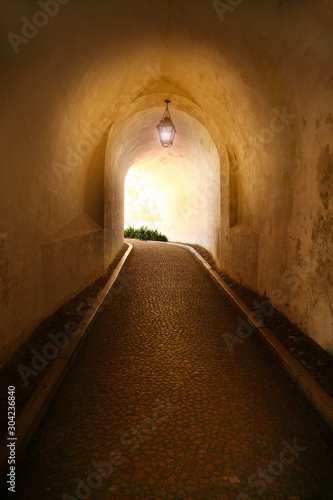alley with light in castle in Lisabon, Portugal Canvas Print