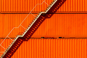 Steel white stair on orange container background. Industrial