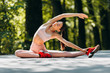 © speed300 - Nice girl stretching in the park outdoor in the morning.- Image