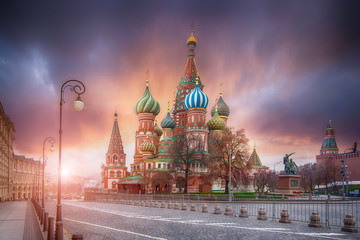 Wall Mural - The Cathedral of Vasily the Blessed known as Saint Basil's Cathedral, is a Russian Orthodox church in Red Square in Moscow, Russia. Beautiful sunrise in a cold morning with amazing sky.