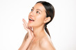 © kitthanes - Beautiful young Asian woman touching soft cheek and smile with clean and fresh skin. Happiness and cheerful with, isolated on white background, Beauty and Cosmetics Concept,