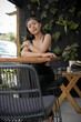 © Anna - Asian girl in a cafe. Beautiful Balinese women.