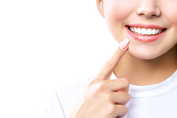 Perfect healthy teeth smile of a young woman. Teeth whitening. Dental clinic patient. Image symbolizes oral care dentistry, stomatology. Isolate en white backround.