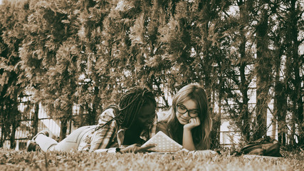 Wall Mural - Couple relaxing in the park