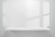 Front View Of Empty Shelf On White Table Showcase And Wall Background With Natural Window Light. Display Of Backdrop Shelves For Showing Minimal Concept. Realistic 3D Render.