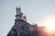 Leinwandbild Motiv Swallow's Nest castle on the rock over the Black Sea on the sunset. Yalta.