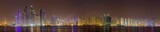 Fototapeta Miasto - Dubai - The evening panorama of Marina towers from Palm Island.