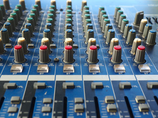 Control music buttons are on sound mixer in the studio.