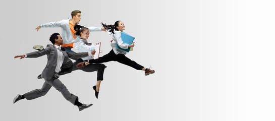 Wall Mural - Happy office workers jumping and dancing in casual clothes or suit with folders on white. Ballet dancers. Business, start-up, working open-space, motion and action concept. Creative collage. Copyspace