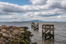 The Entrance To The Harbour With The Coast Of Scotland In The Background, Seen From The West Beach In Silloth, Cumbria, England, UK