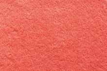 The Texture Of The Terry Towel Is Coral Color. Abstract Red Soft Fabric Background.