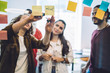 © BullRun - Young students writing plan on notes