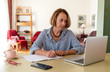© SianStock - Middle age senior woman working at home using computer