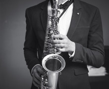 One Caucasian Man Saxophonist Playing Saxophone Player In Studio Silhouette Isolated On White Background