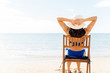 © AntonioDiaz - Woman Chilling On Chair At Beach In Summertime