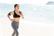 © AntonioDiaz - Beautiful Woman Jogging At Beach In Summer