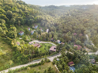 Wall Mural - Aerial view on the roofs of houses on the island of Koh Phangan. Thailand