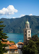 View of Lake Lugano & Cathedral of Saint Lawrence in Lugano, Switzerland